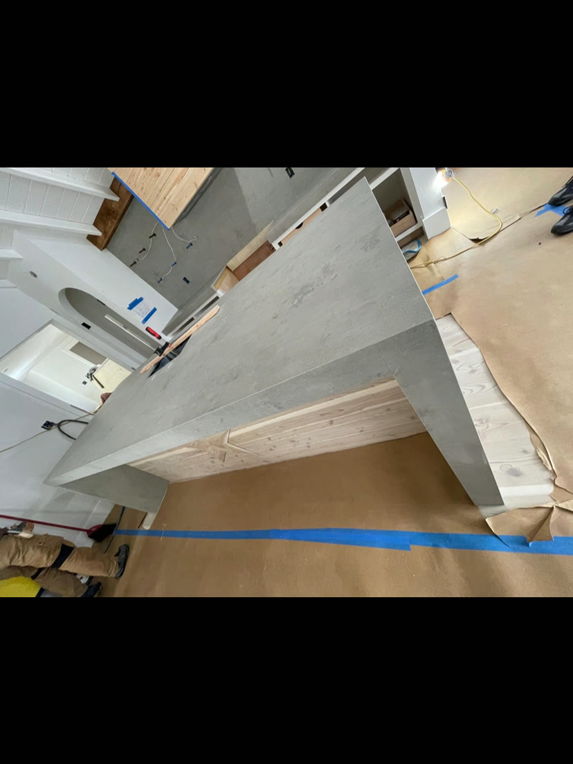 Authentic Marble & Granite fitting a stone island countertop on site